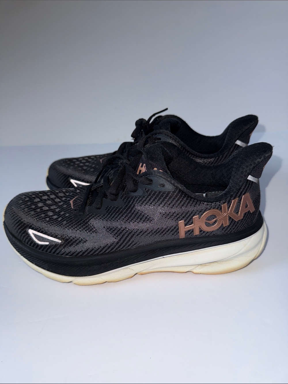 Hoka Women's Black Athletic Shoes with Rose Gold Logo
